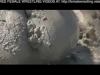 Girls wrestling forth put emphasize mud